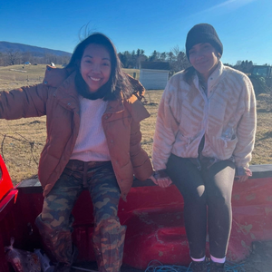 Ria and business partner on a farm