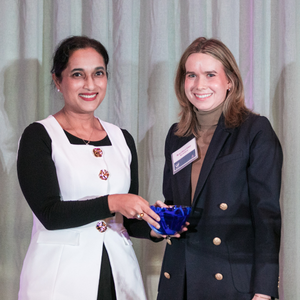 Pro Bono attorney accepts an award at Ayuda's Signature Spring Event